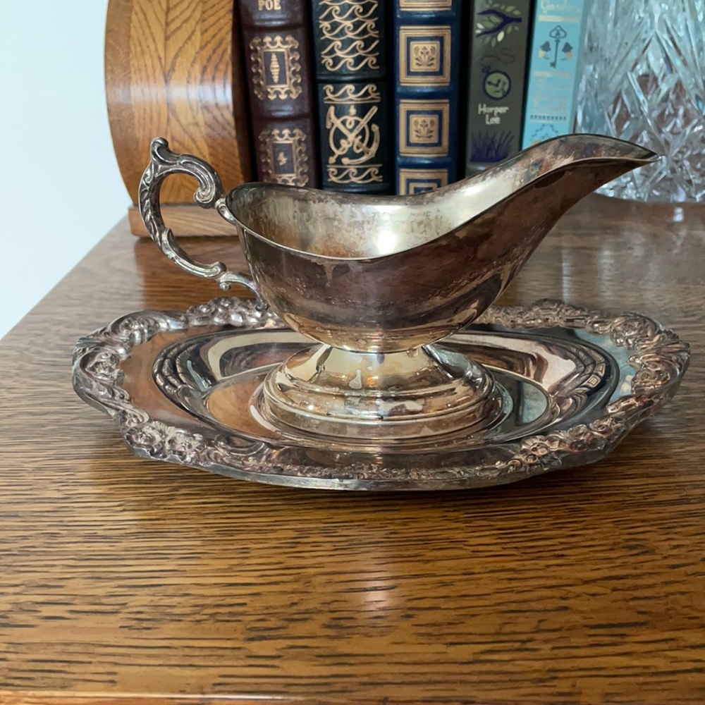 Vintage silver plate gravy boat with under-plate.